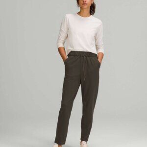 Lululemon stretch high rise straight legs pants Luxtreme dark olive size 12